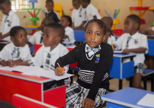 A school girl in the Classroom.